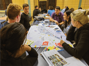 group of people at a table having a meeting